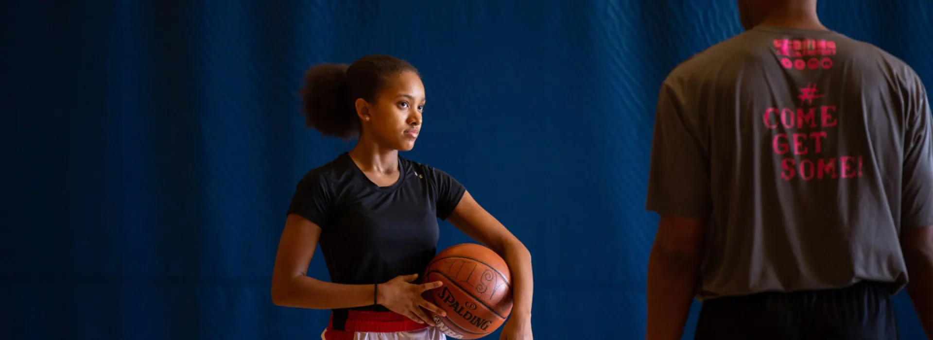 young girl learning basketball skills at YMCA PIttsburgh