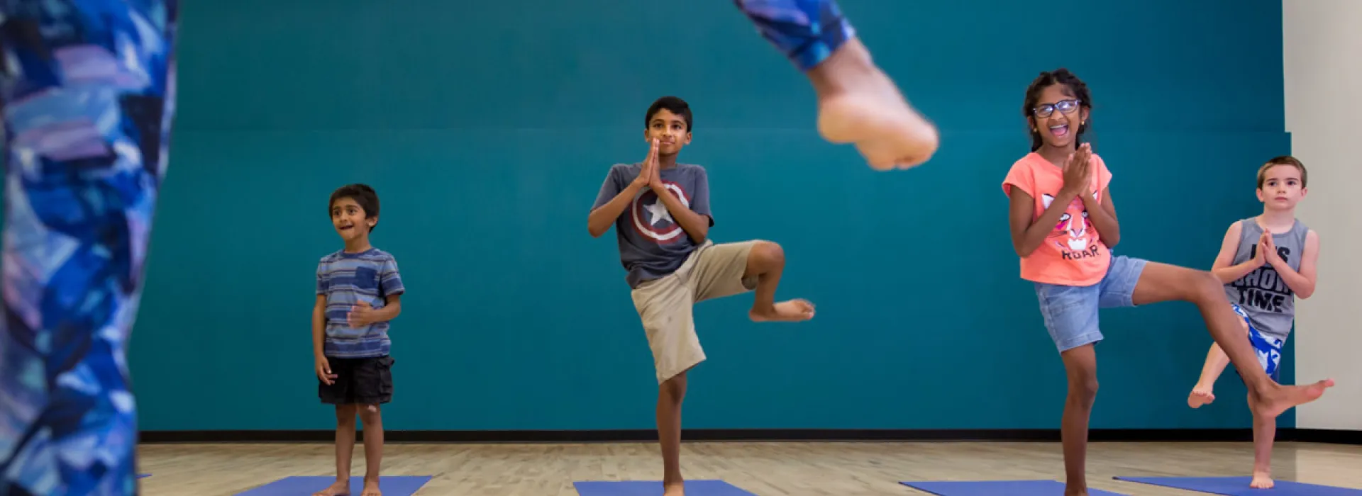 young kids in yoga class at YMCA Pittsburgh